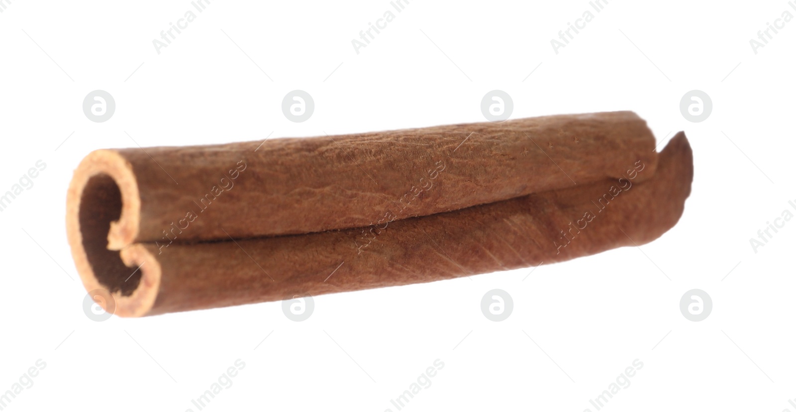 Photo of One aromatic cinnamon stick isolated on white