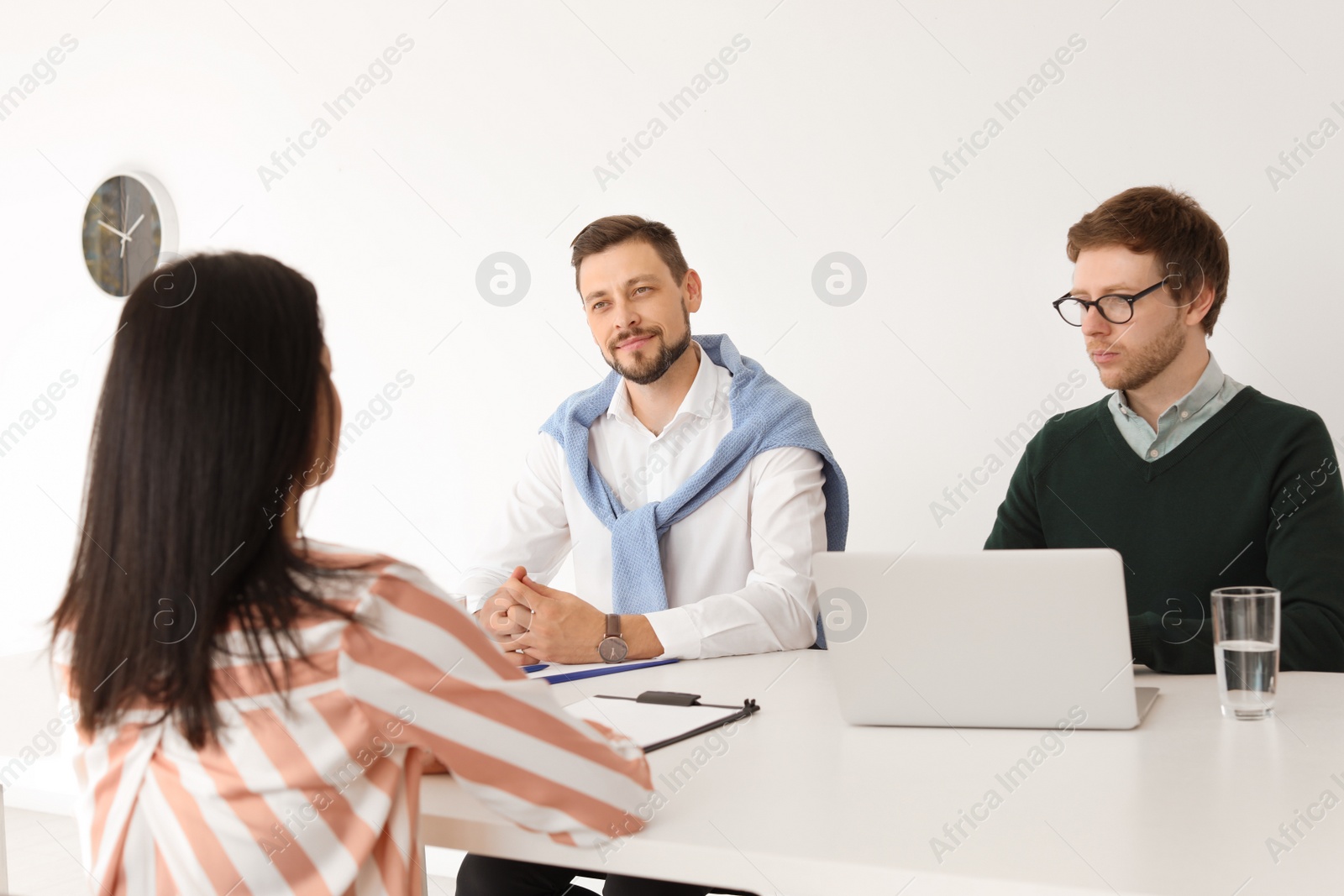 Photo of Human resources commission conducting job interview with applicant in office