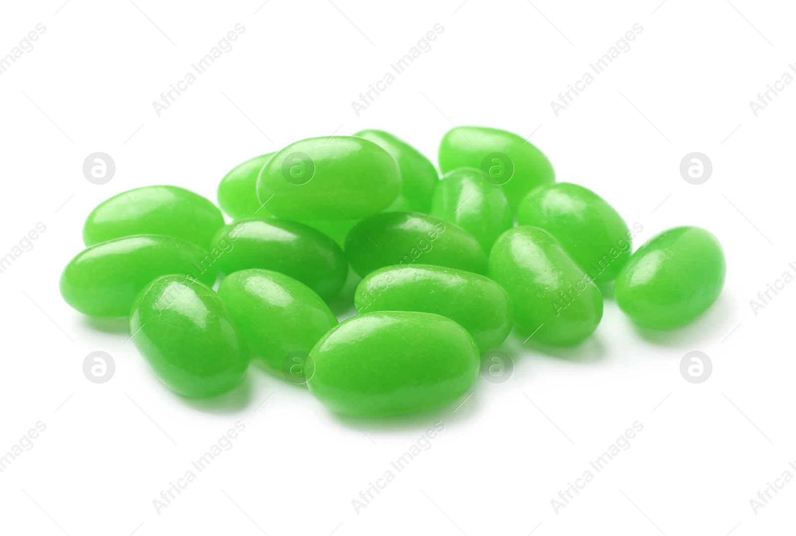 Photo of Pile of tasty bright jelly beans isolated on white