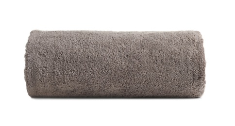 Photo of Rolled soft terry towel on white background