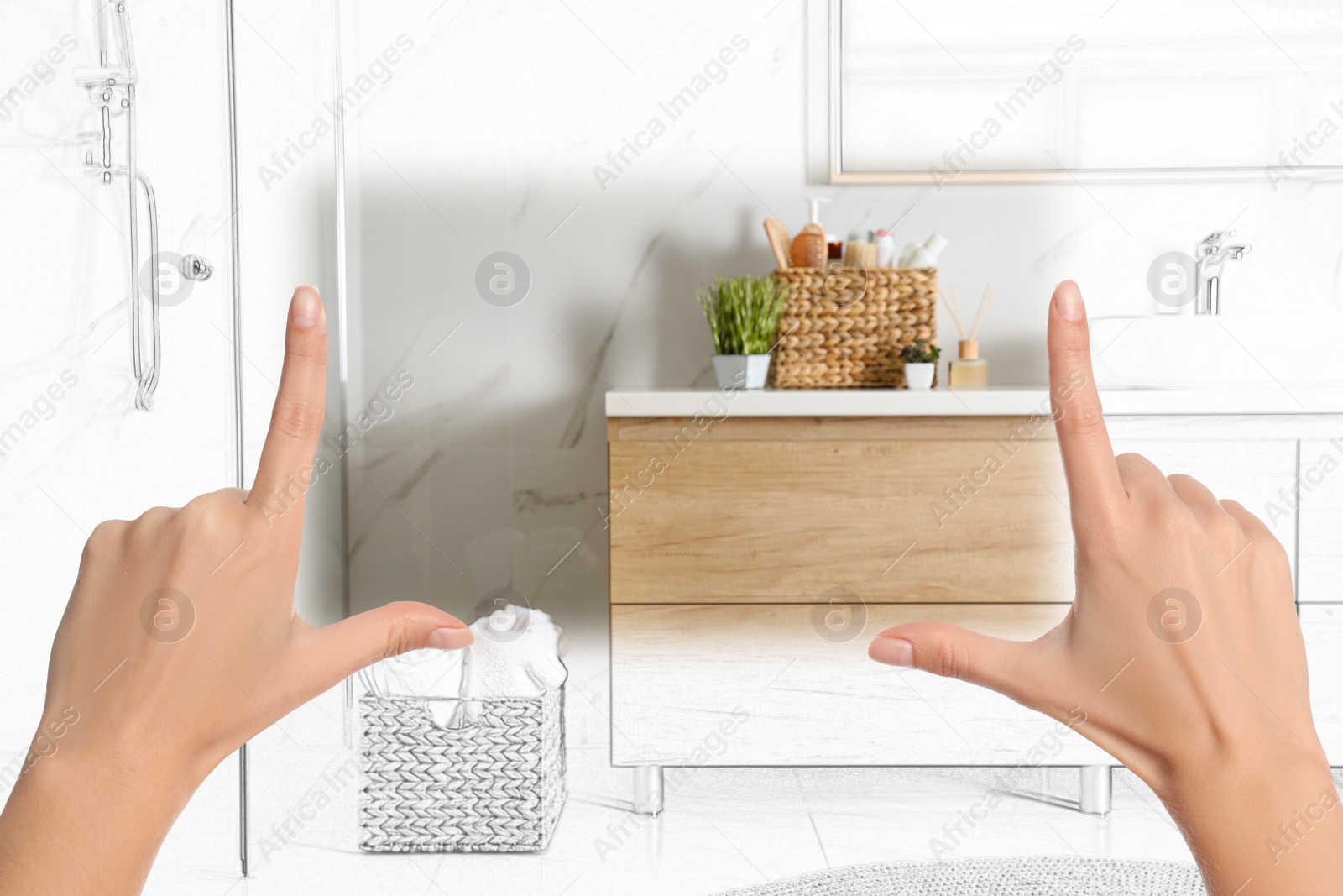 Image of Woman showing frame gesture and making bathroom real out of drawing