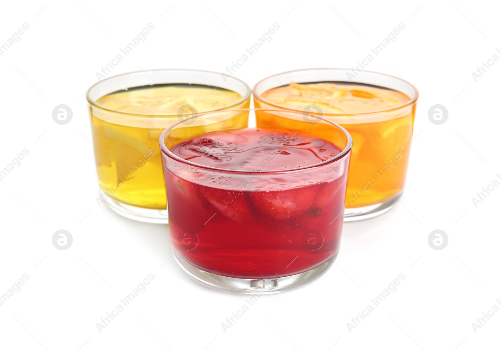 Photo of Tasty jelly desserts in glasses on white background