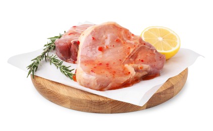 Photo of Board with raw marinated meat, lemon and rosemary isolated on white