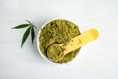 Photo of Hemp protein powder and green leaf on white table, flat lay