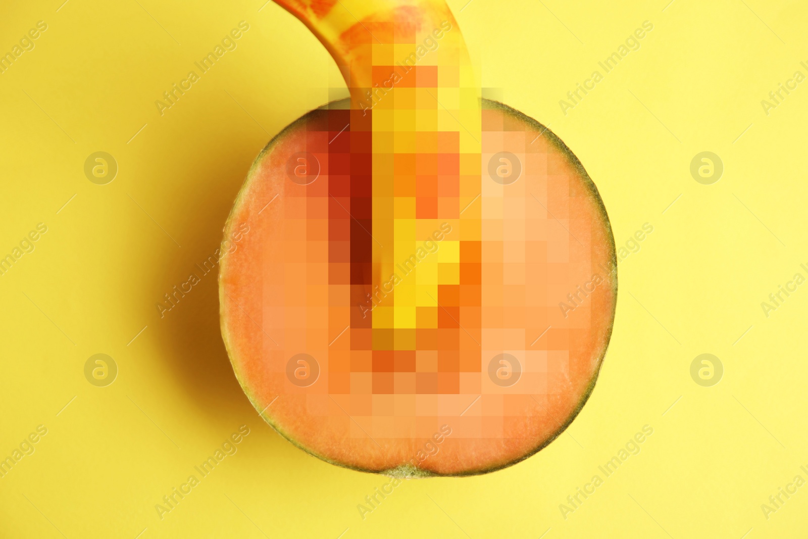 Image of Fresh banana and melon on yellow background, top view. Sex concept