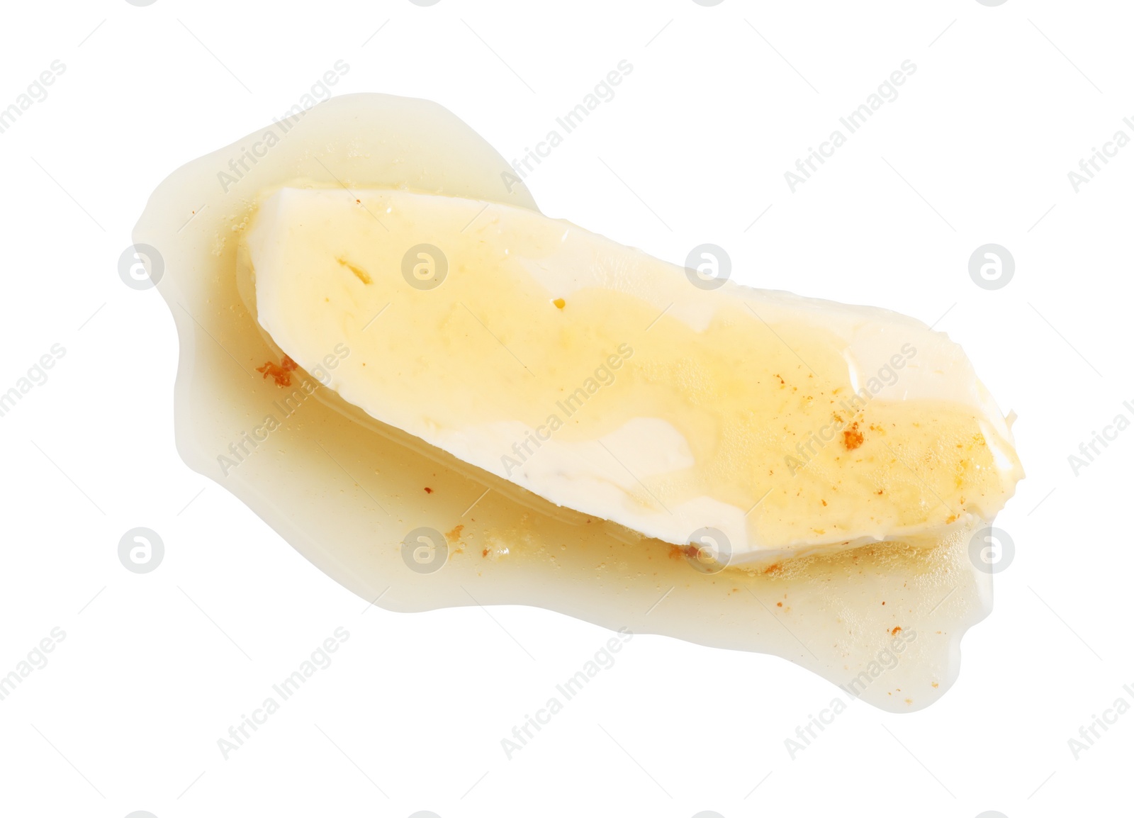 Photo of Piece of melting butter on white background, top view