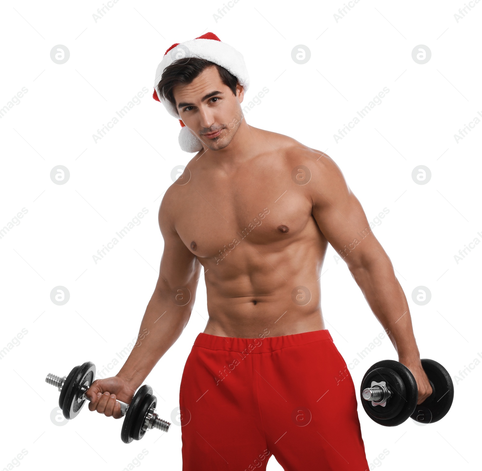 Photo of Sexy shirtless Santa Claus with dumbbells on white background