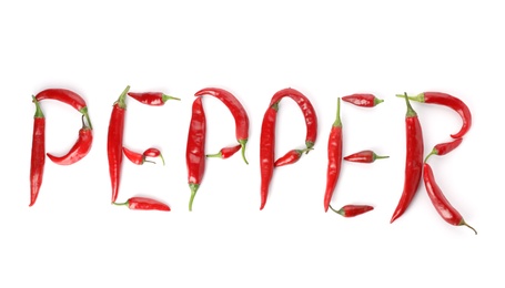 Word PEPPER made with red chili pods on white background, top view