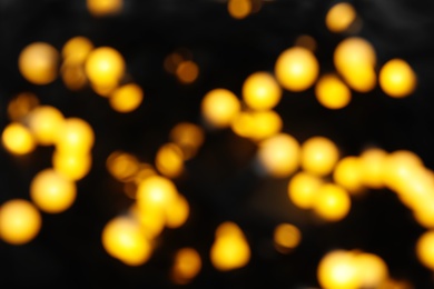 Photo of Blurred view of beautiful Christmas lights. Festive background