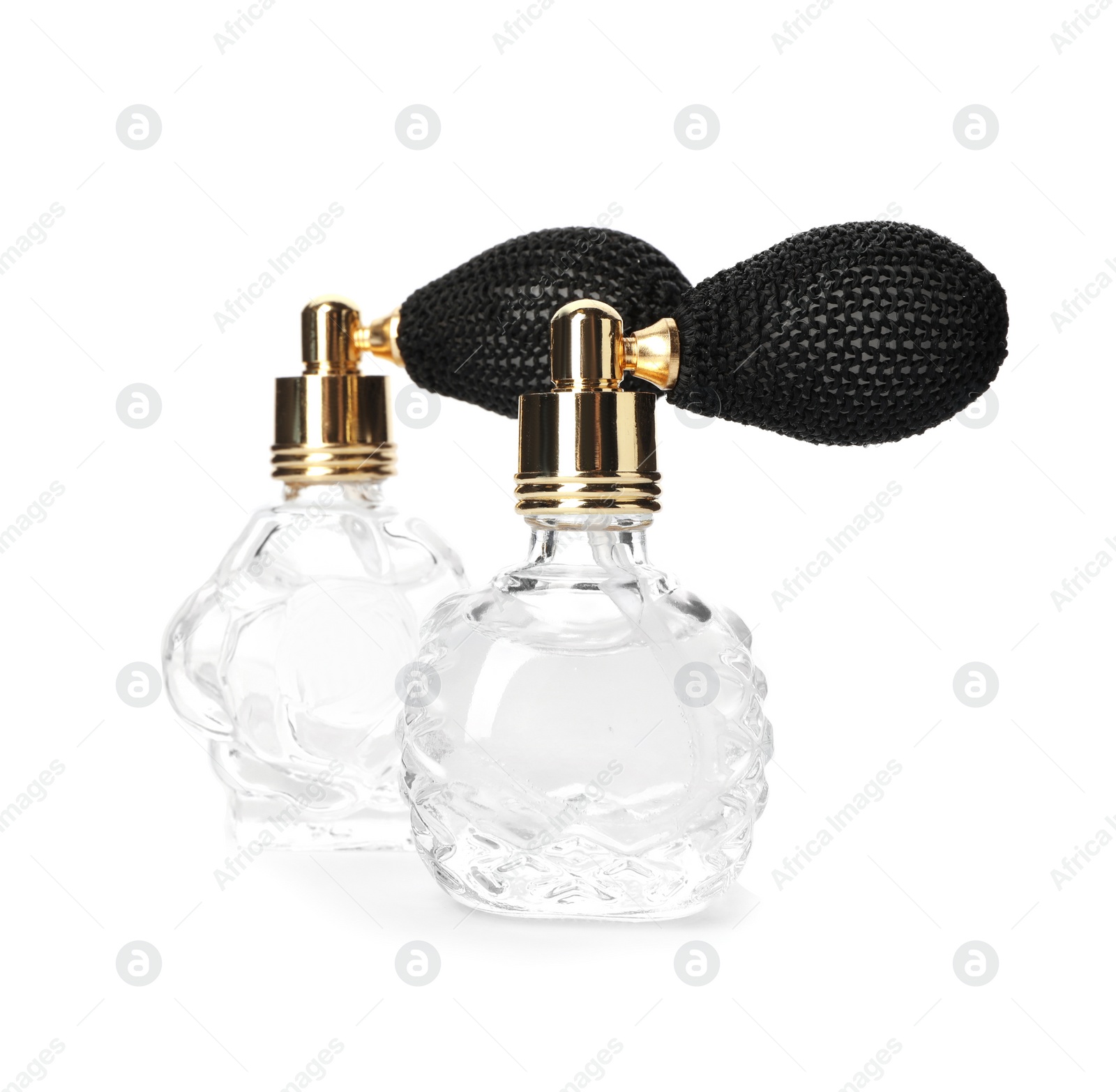 Photo of Vintage bottles of perfume isolated on white