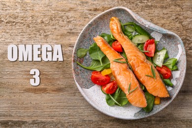 Image of Omega 3. Pieces of grilled salmon with vegetables on wooden table, top view