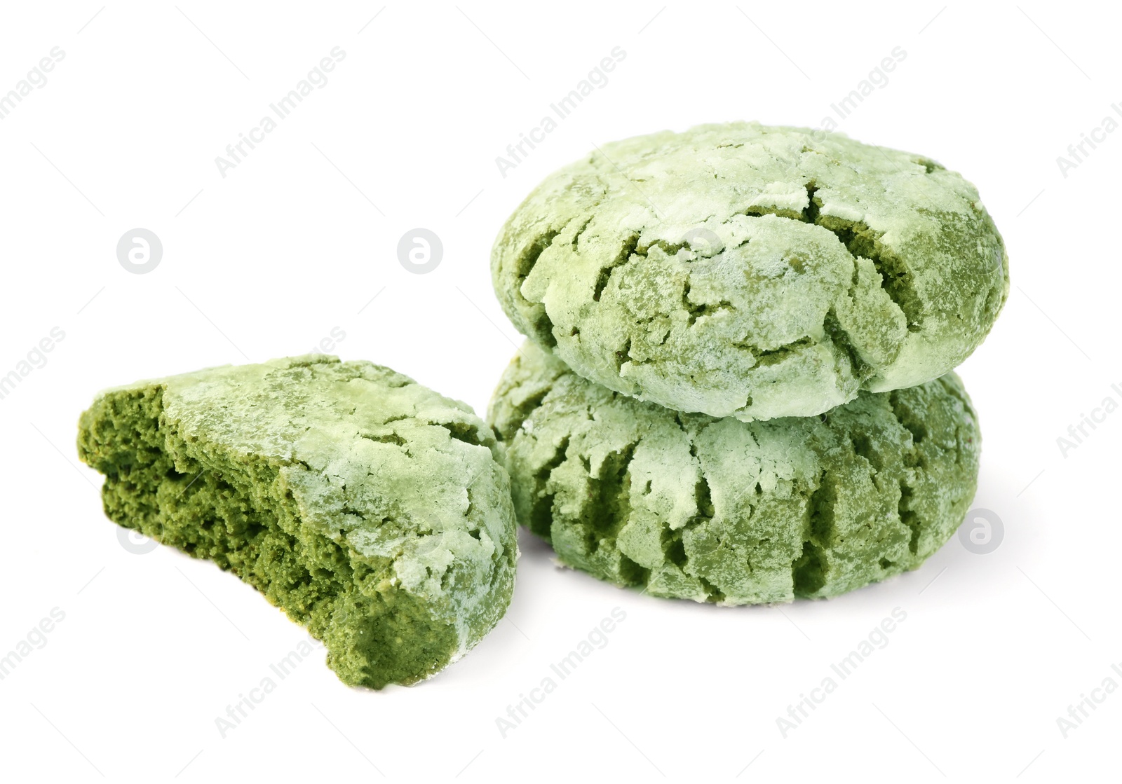 Photo of Tasty whole and broken matcha cookies on white background