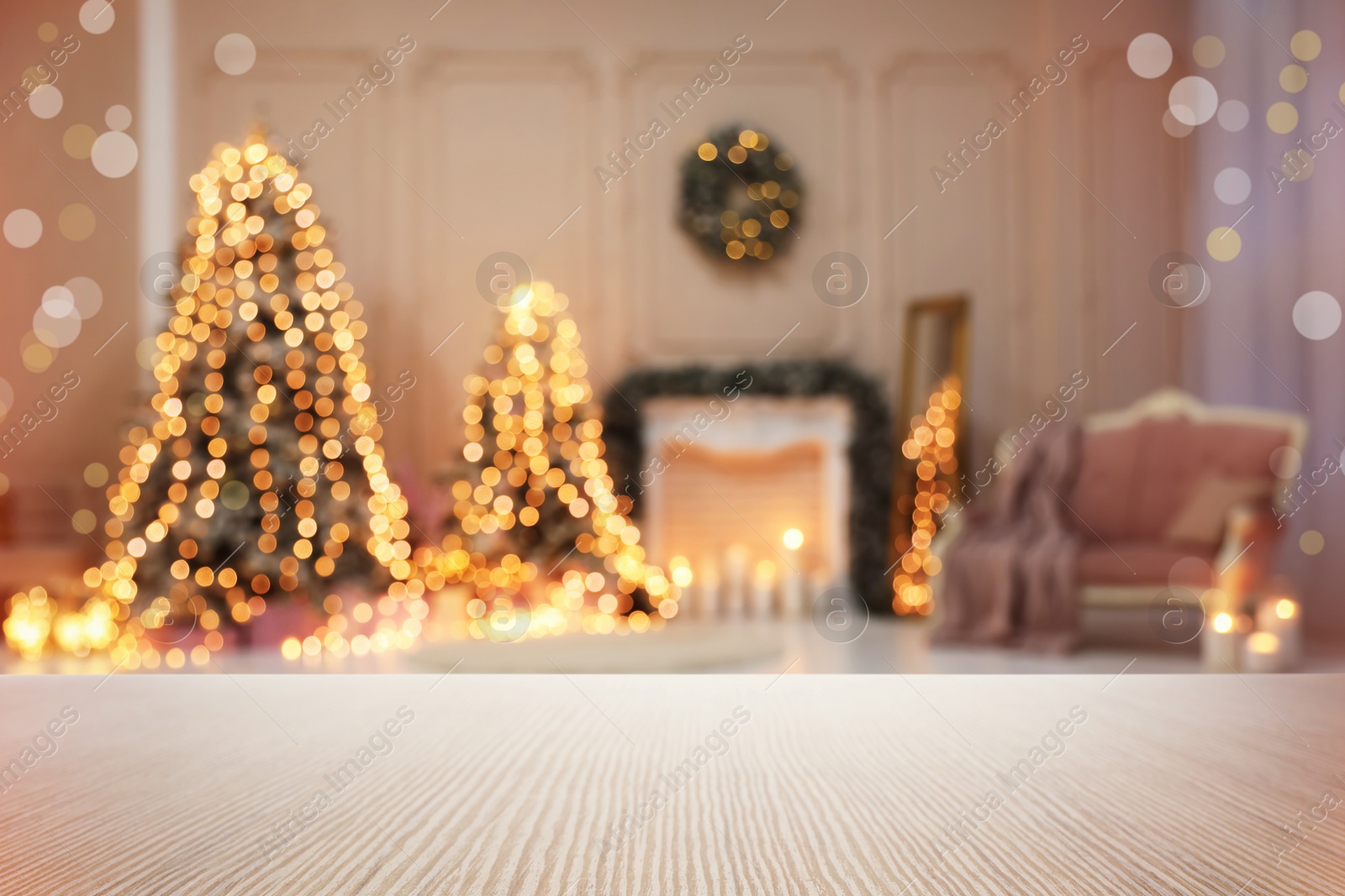 Image of Empty wooden surface and blurred view of room decorated for Christmas