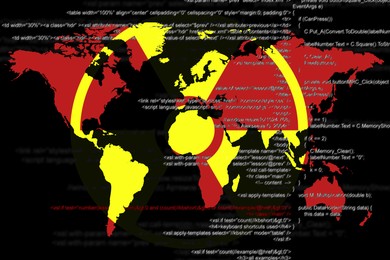 Nuclear deterrence. Warning radiation symbol, world map and source code on black background