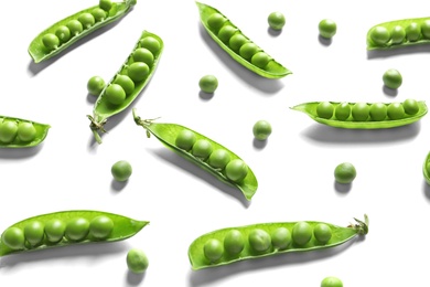 Photo of Delicious fresh green peas on white background