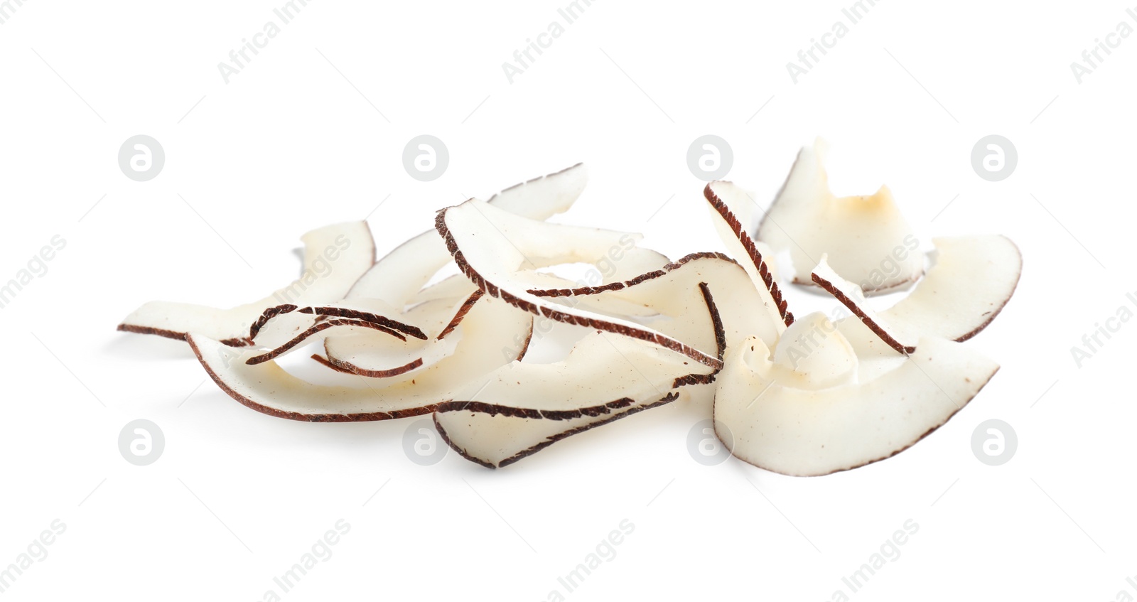 Photo of Pile of tasty coconut chips isolated on white