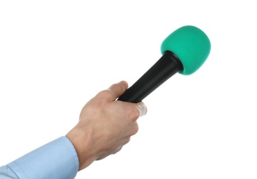 Woman holding microphone on white background, closeup