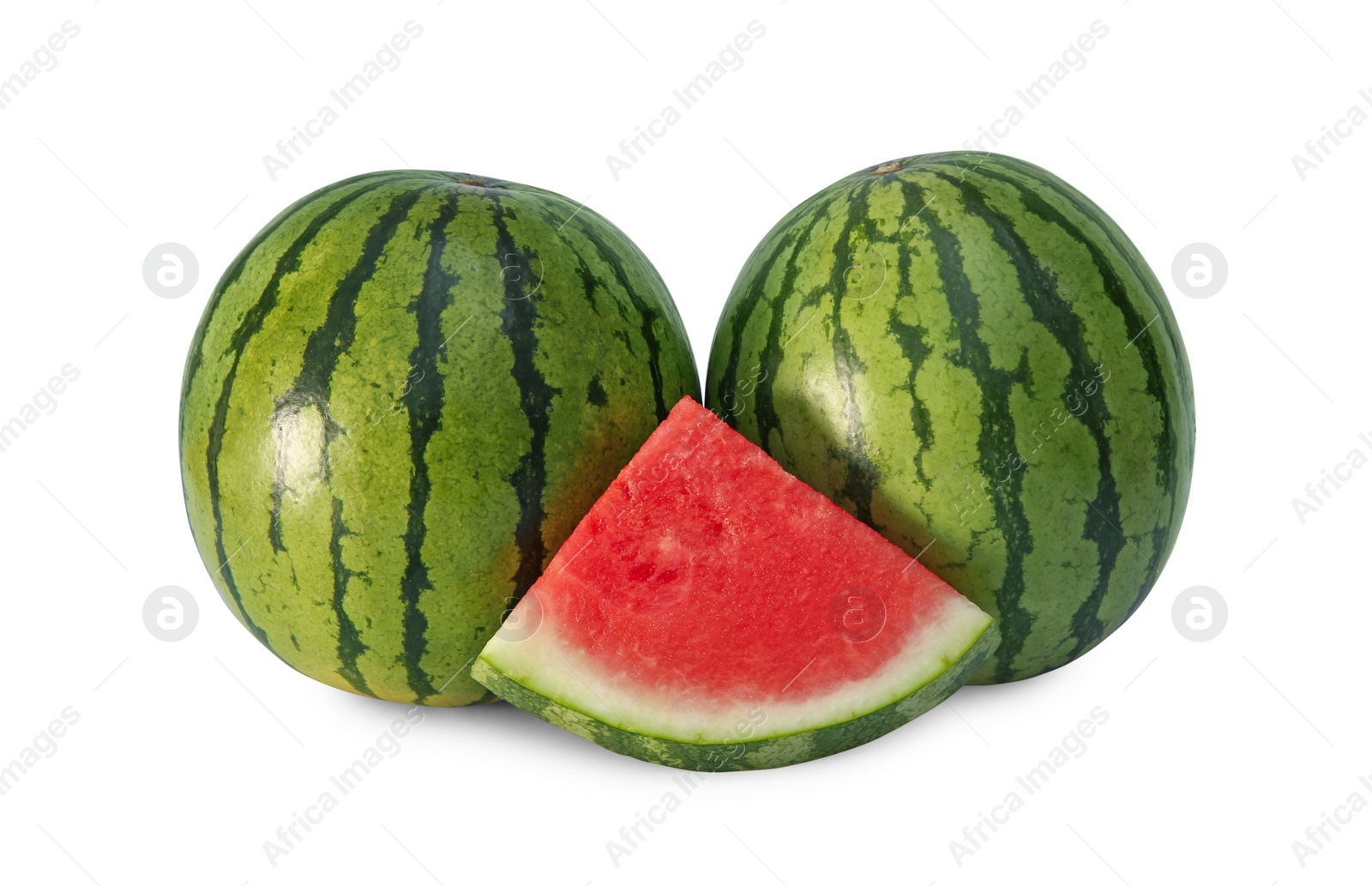 Photo of Delicious cut and whole ripe watermelons isolated on white