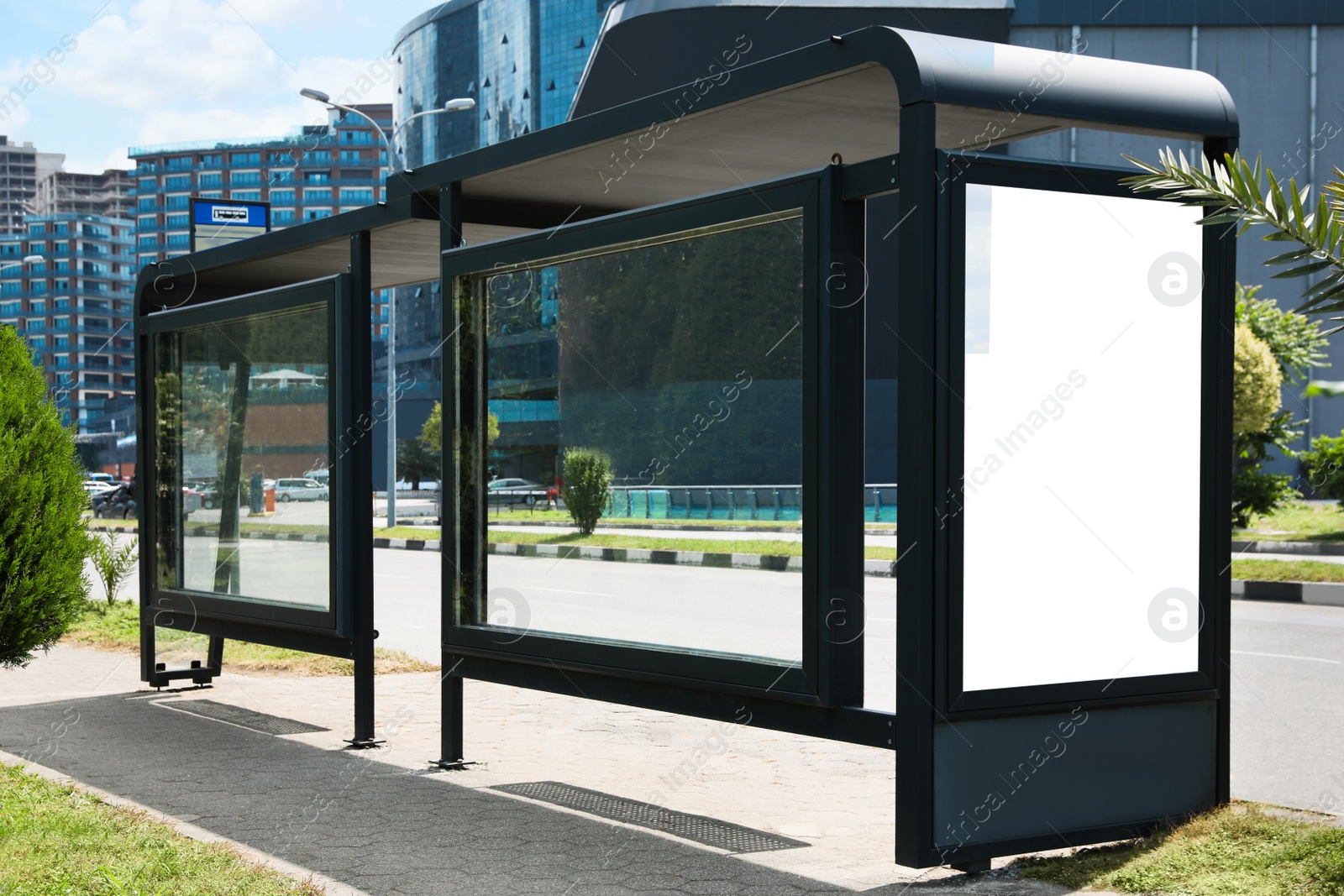 Photo of Modern public transport stop on city street