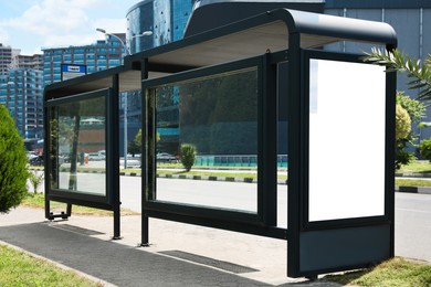 Photo of Modern public transport stop on city street