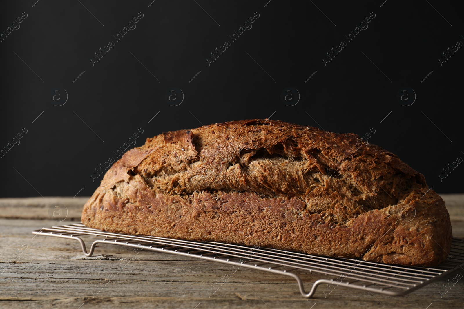 Photo of Freshly baked sourdough bread on wooden table