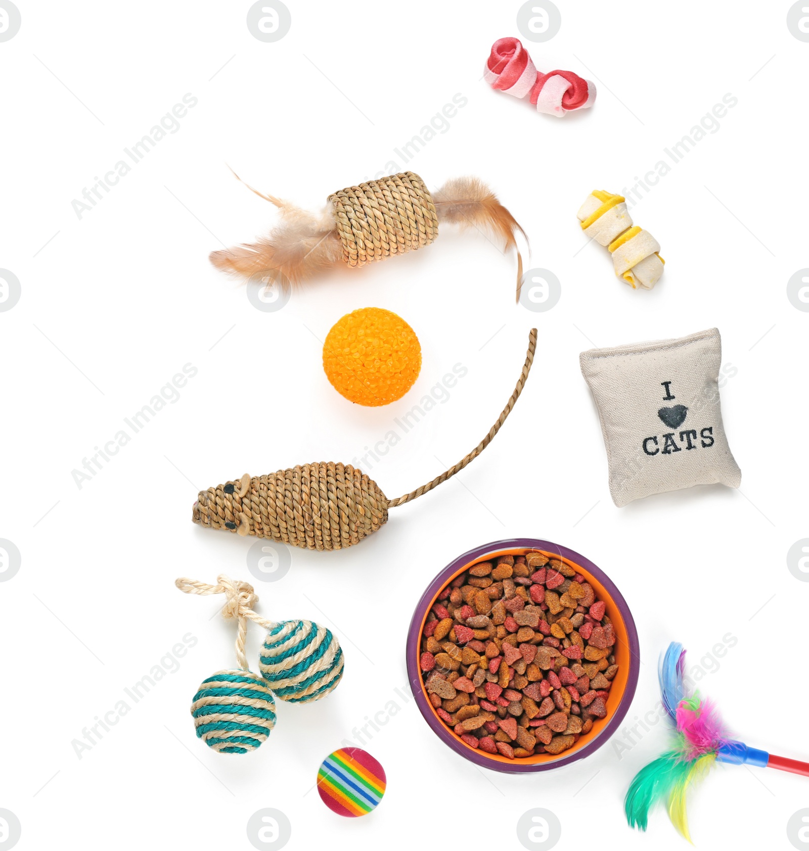 Photo of Cat's accessories and food on white background