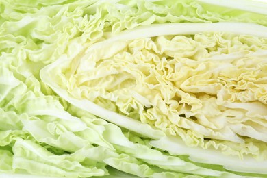 Photo of Fresh ripe Chinese cabbage as background, closeup