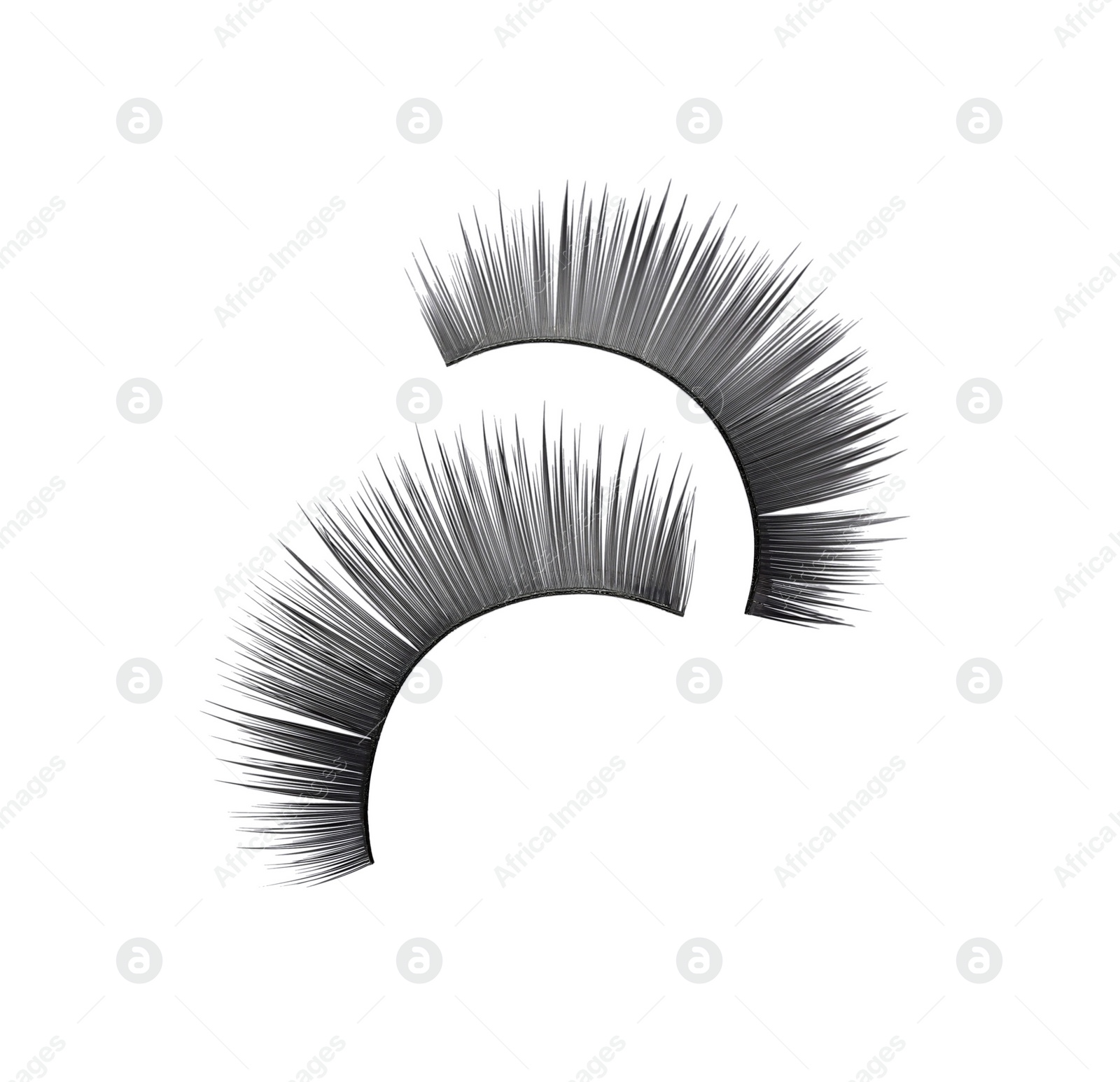 Photo of Fake eyelashes on white background, top view. Makeup product