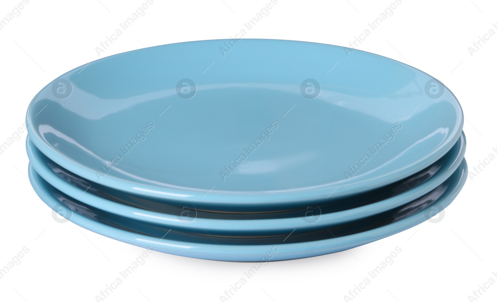 Photo of Three clean ceramic plates isolated on white