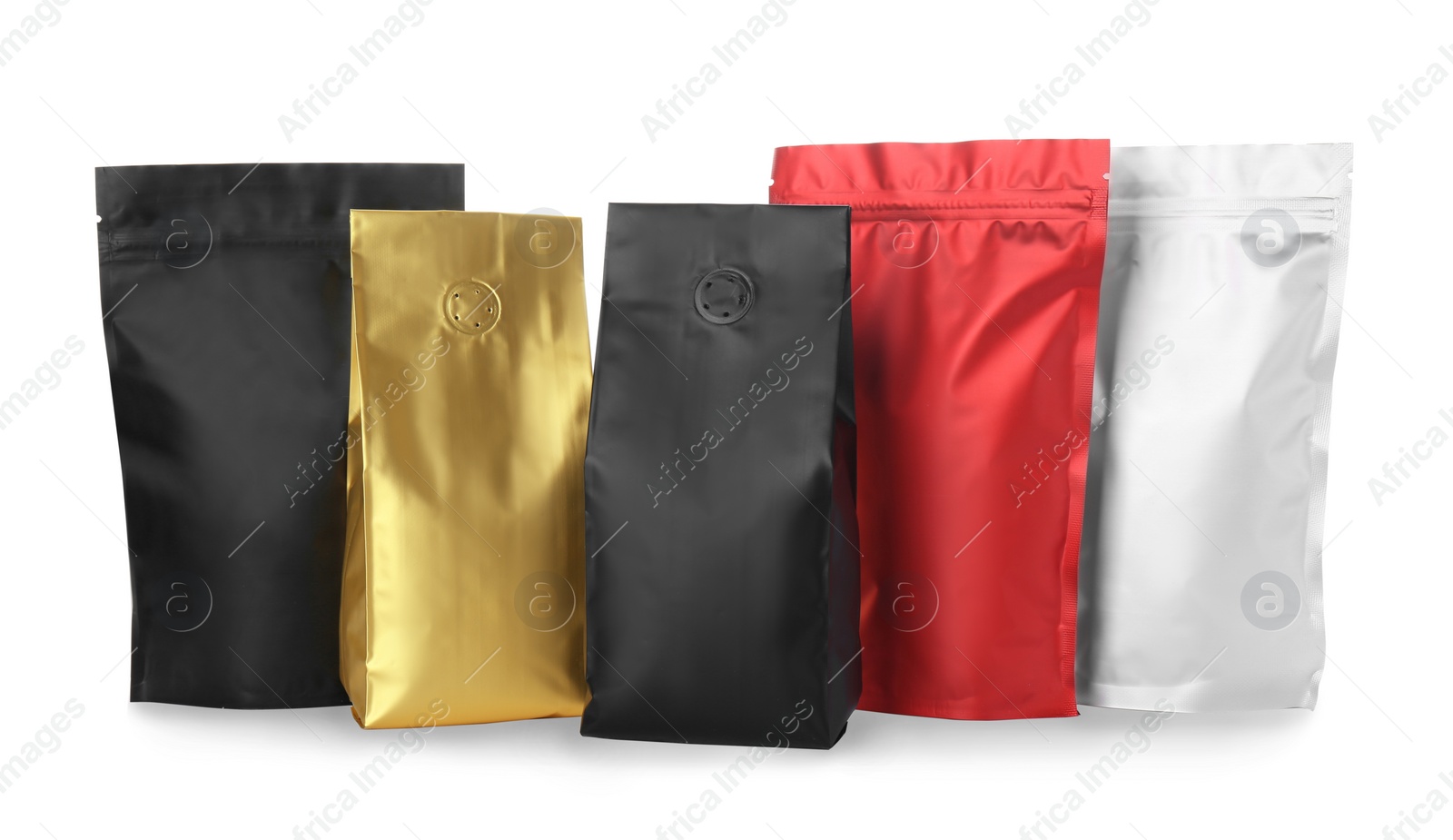 Photo of Different blank foil packages isolated on white