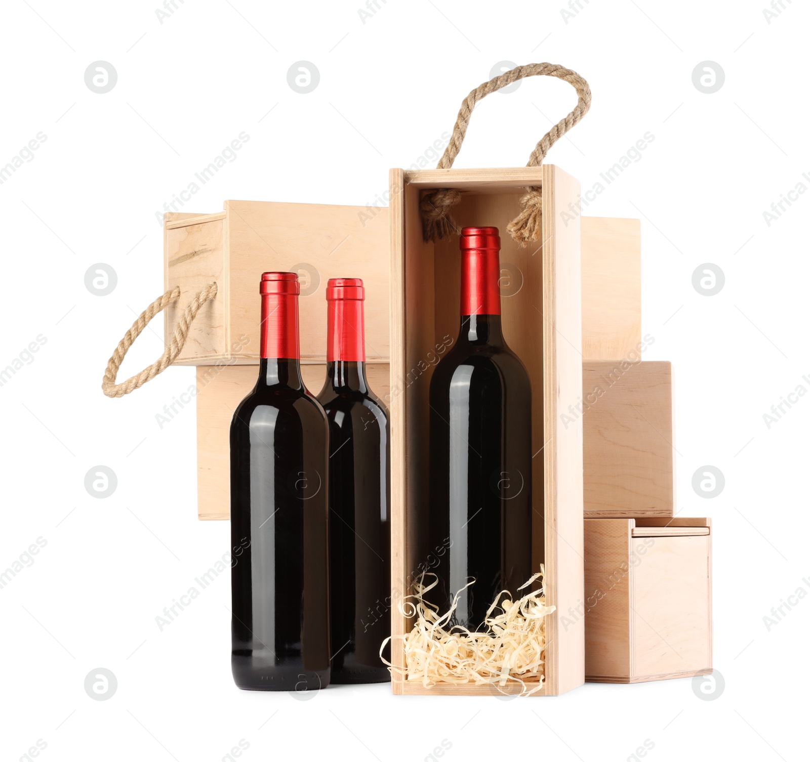 Photo of Wooden gift boxes with wine isolated on white