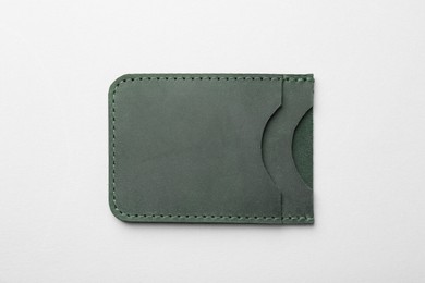 Photo of Empty leather card holder on light grey background, top view