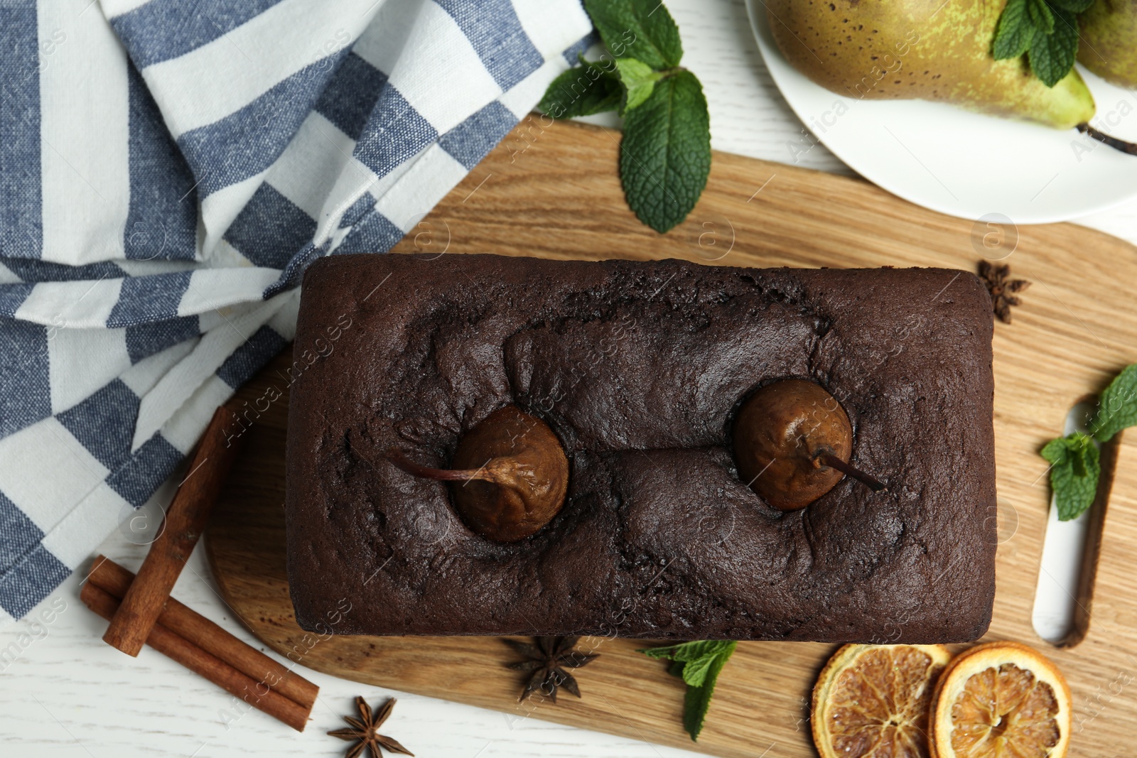 Photo of Flat lay composition with tasty pear bread on white wooden table. Homemade cake