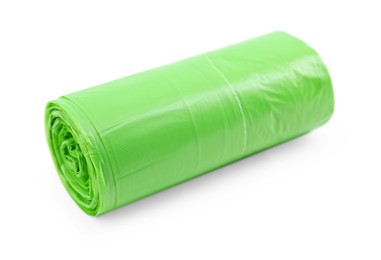 Photo of Roll of light green garbage bags isolated on white