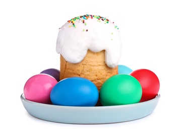 Photo of Traditional Easter cake and dyed eggs isolated on white