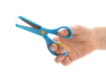 Photo of Woman holding training scissors on white background, closeup