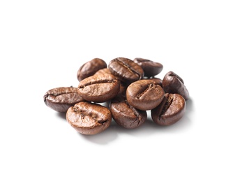 Photo of Pile of roasted coffee beans on white background