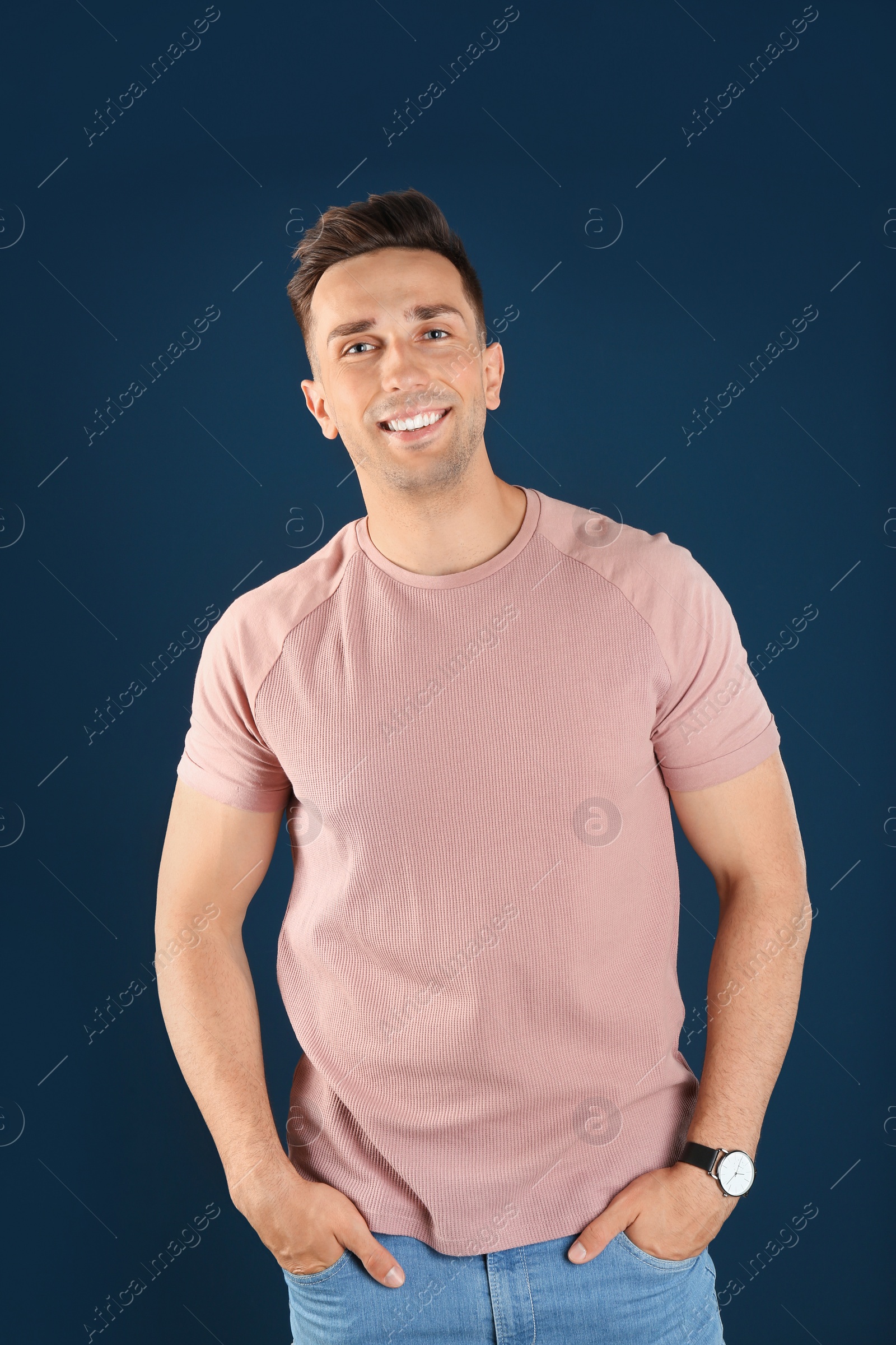 Photo of Portrait of handsome man on color background