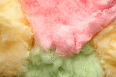 Photo of Colorful fluffy cotton candy as background, closeup