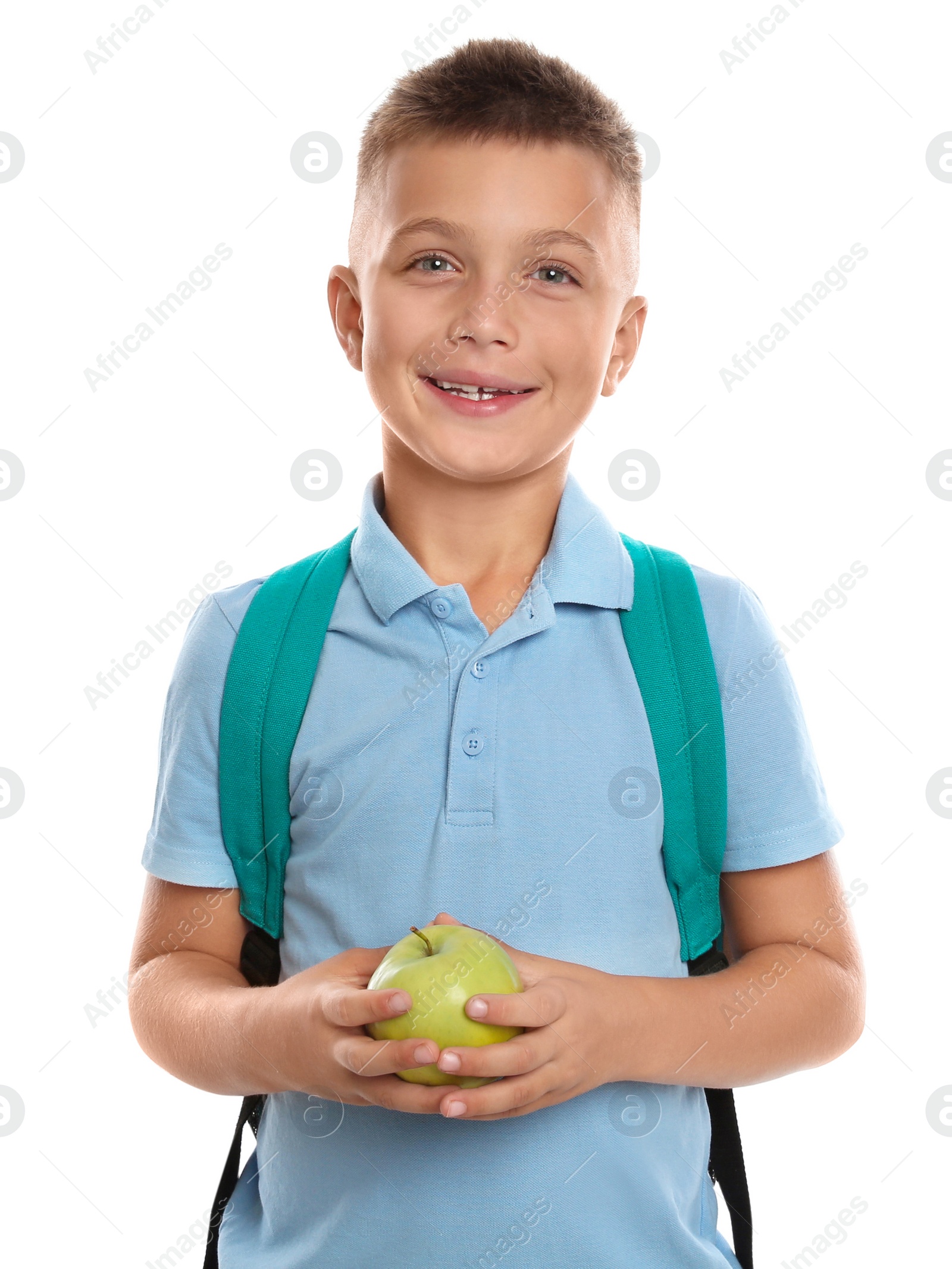 Photo of Happy boy holding apple on white background. Healthy food for school lunch