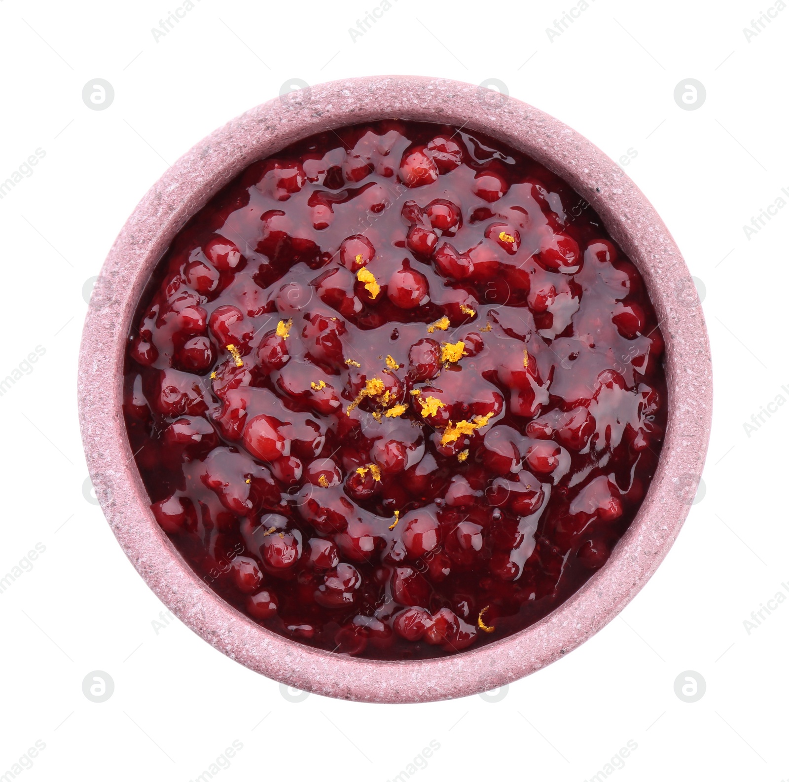 Photo of Tasty cranberry sauce in bowl isolated on white, top view
