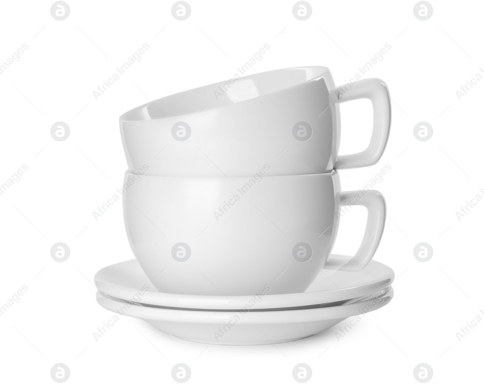 Photo of Stack of clean tableware isolated on white