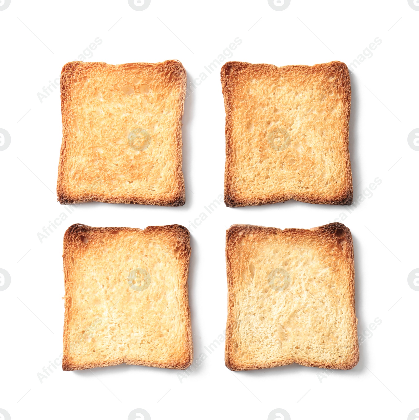 Photo of Toasted bread on white background, top view