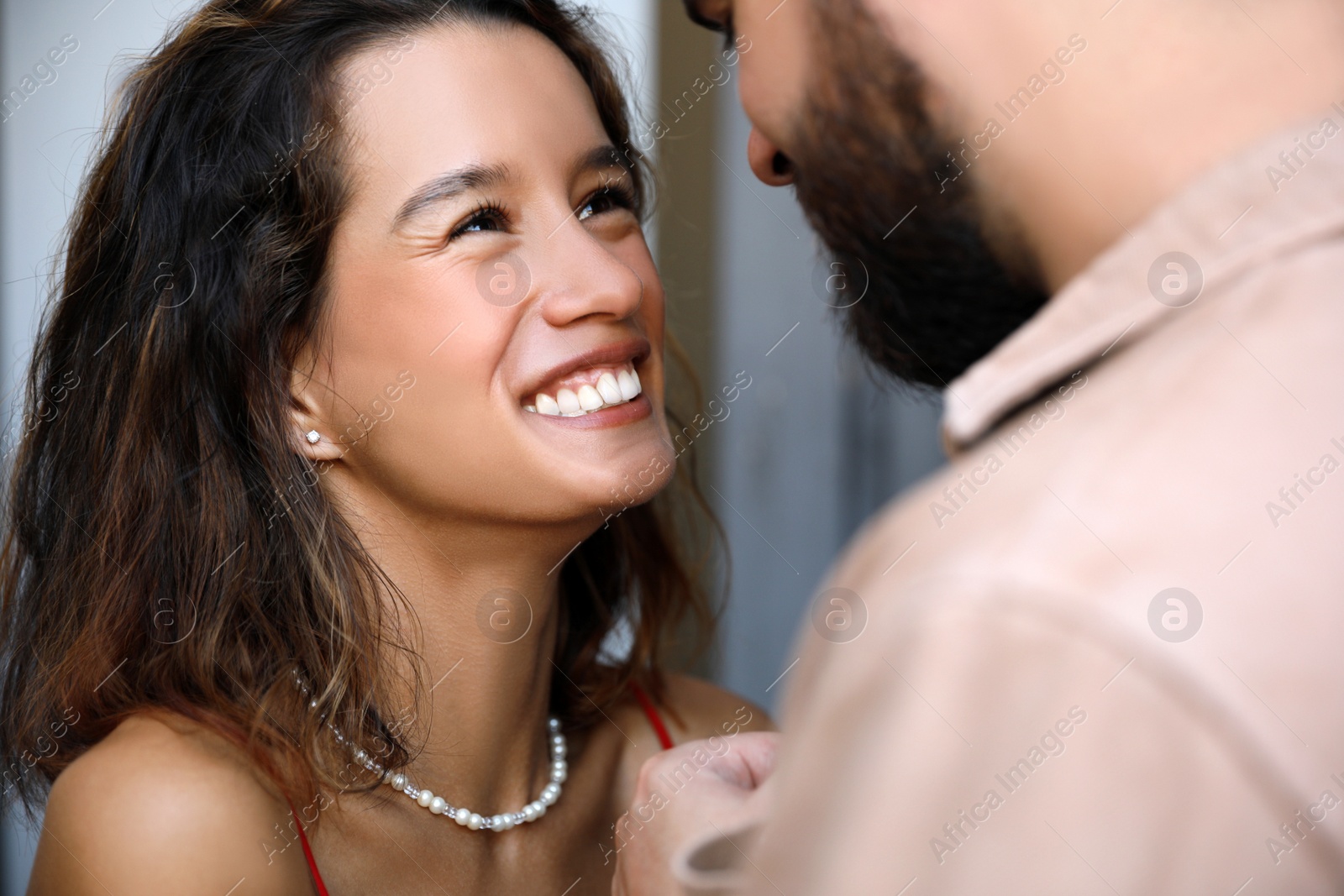 Photo of Happy young couple together outdoors, closeup view