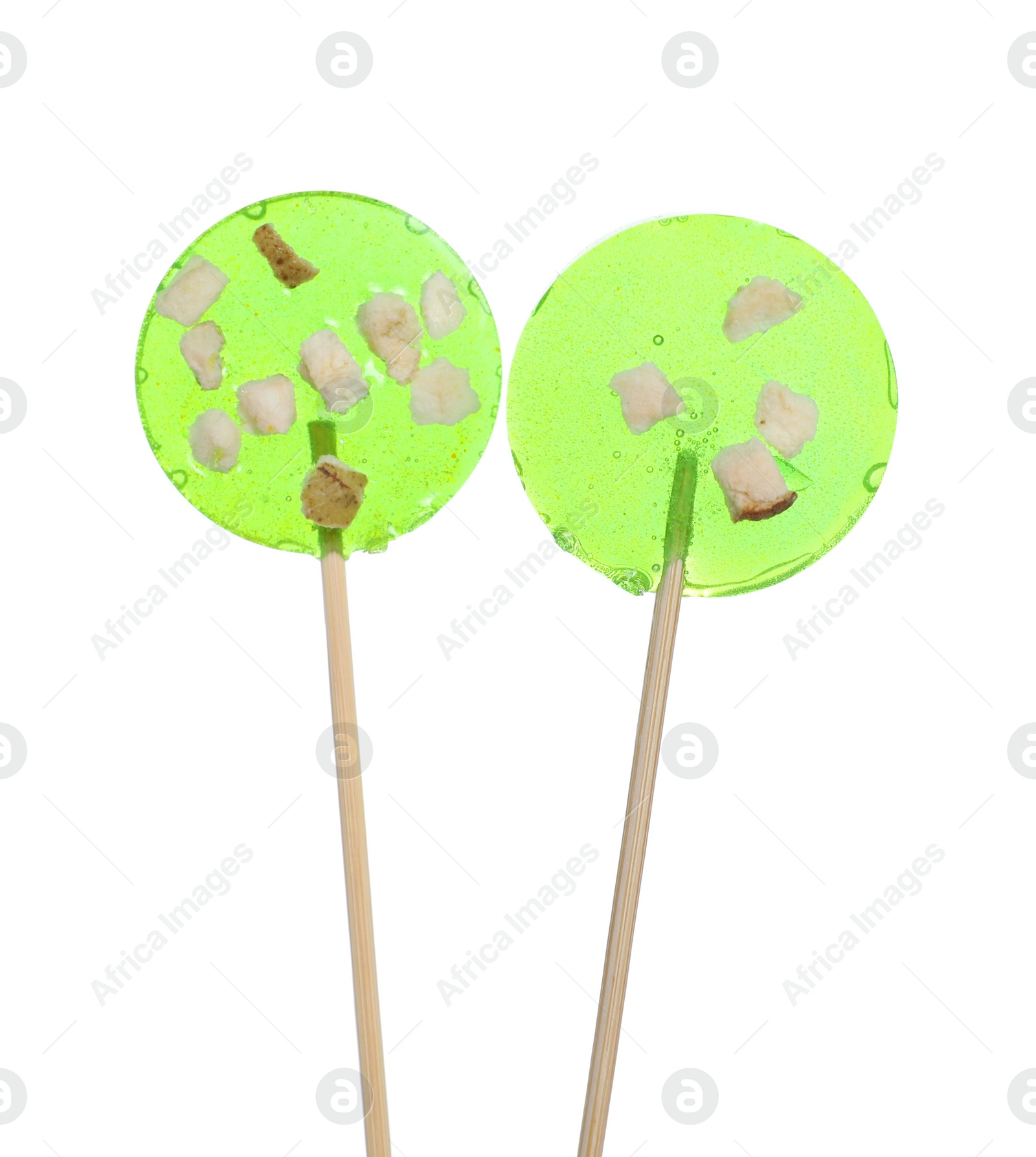 Photo of Sticks with light green lollipops isolated on white