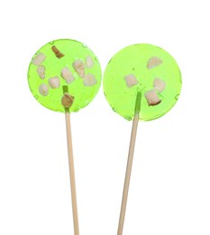 Sticks with light green lollipops isolated on white