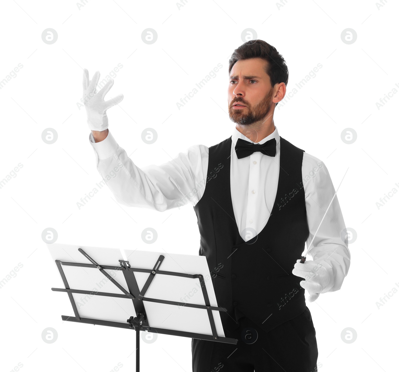 Photo of Professional conductor with baton and note stand on white background