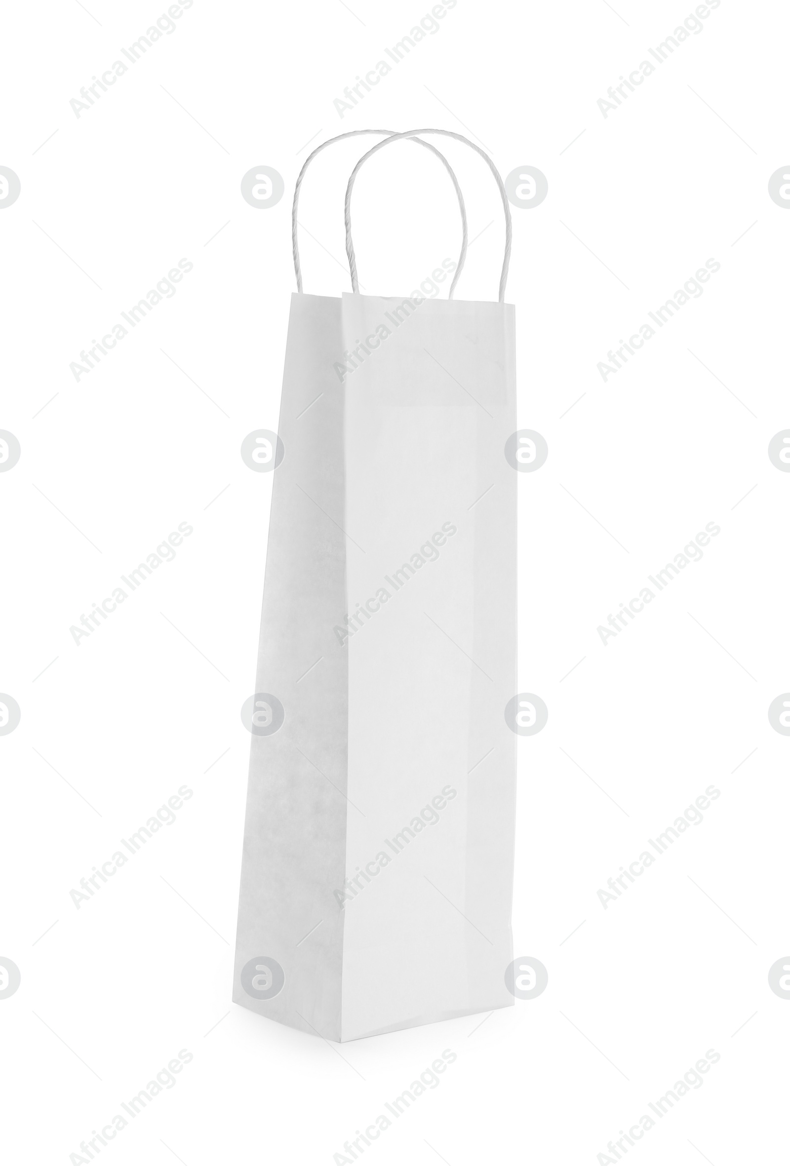 Photo of Blank paper bag isolated on white. Mockup for design