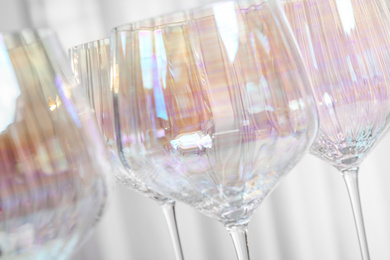 Set of glasses on light background, closeup