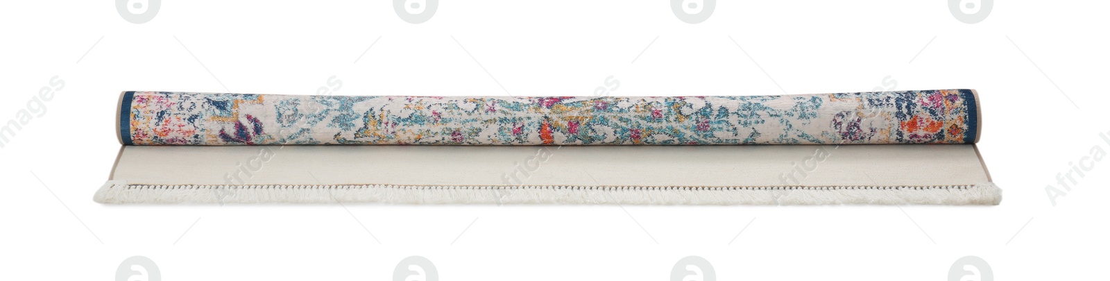 Photo of Rolled carpet with pattern on white background. Interior element